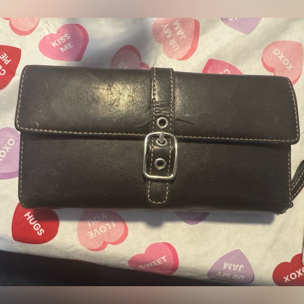 Woman’s Coach wallet . Black leather . Good condition